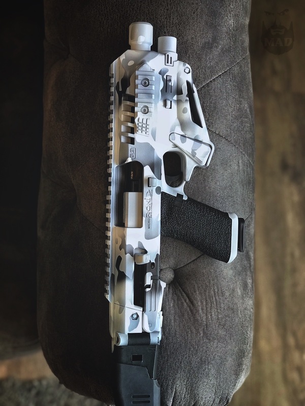 Grey Micro Roni Micro Roni in a Cerakote Snow Camo Finish by David Teves | Cerakote