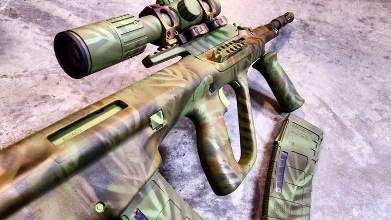 Steyr Aug with a Custom Jungle Camo Finish by ARMISTEAD COLEMAN | Cerakote