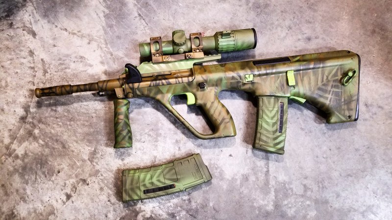 Steyr Aug with a Custom Jungle Camo Finish by ARMISTEAD COLEMAN | Cerakote