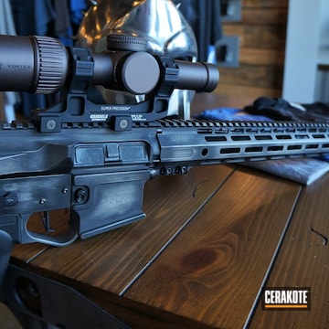 Cerakoted Battleworn Tactical Rifle With A Cerakote H-146 And H-170 Finish