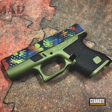 Cerakoted Custom Glock 43 Handgun With A Cerakote Hawaiian Themed Finish