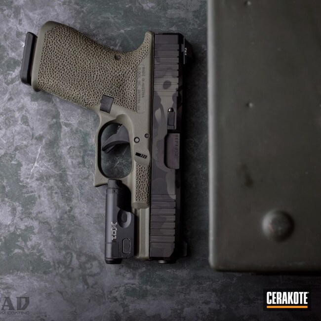 Cerakoted Glock 19 Handgun With A Custom Black Multicam Finish