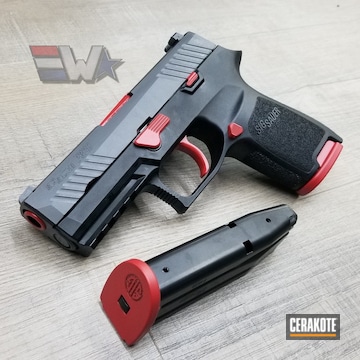 Cerakoted Sig Sauer P320 Handgun With A Two Toned Black And Red Cerakote Finish