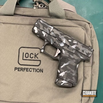 Cerakoted Glock 43 In A Cerakote Multicam Finish