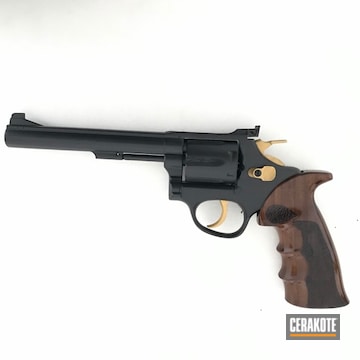 Cerakoted Refinished Taurus Revolver In Cerakote H-122 Gold And E-100 Blackout