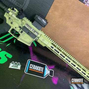 Cerakoted Zev Ar-15 Rifle With A Green And Black Cerakote Finish