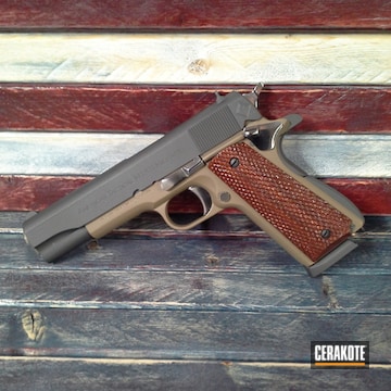 Cerakoted American Tactical 1911 Handgun Finished In H-146 Graphite Black And H-261 Glock Fde