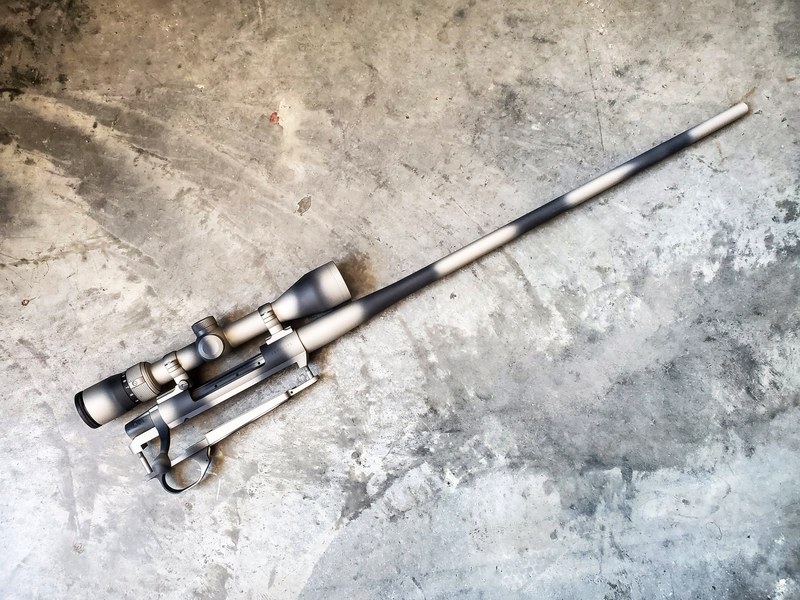 Chipped Coating Rifle Hunting Rifle with a Cerakote Montana Rock Camo Finish by ARMISTEAD ...