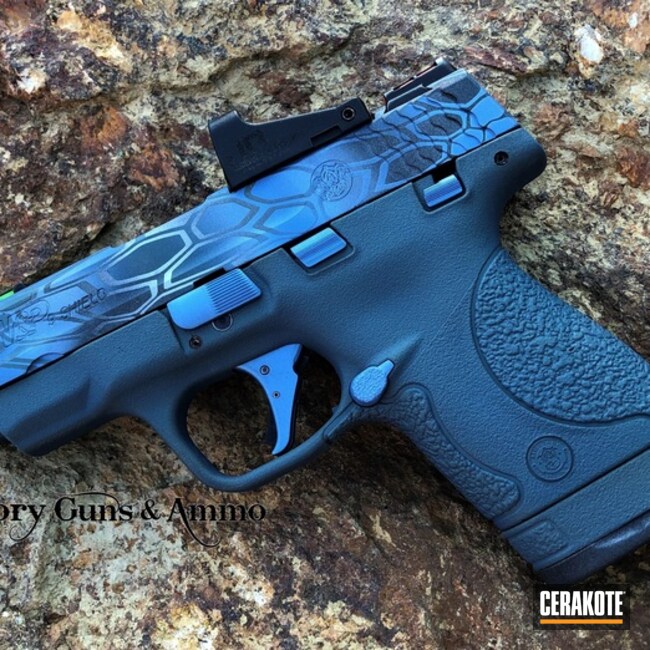 Cerakoted Smith & Wesson Handgun With A Blue Cerakote Kryptek Finish