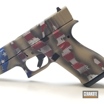 Cerakoted Glock 48 Handgun With A Torn Us Flag Cerakote Finish