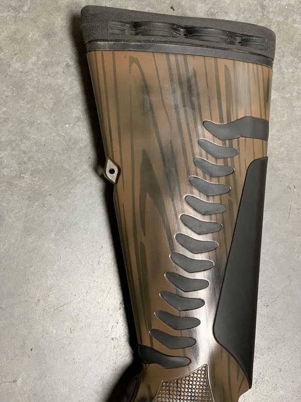 Shotgun with a Custom Cerakote Wood Grain Finish by DAVID SETH | Cerakote