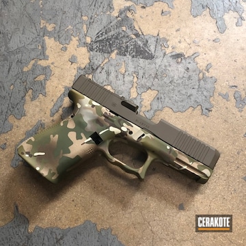Cerakoted Glock 19 Handgun With A Cerakote Multicam Finish