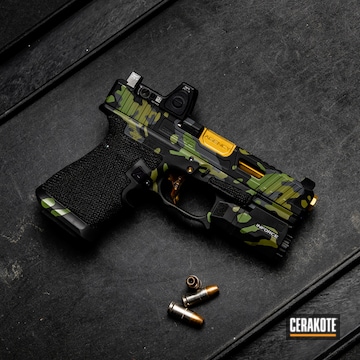Cerakoted Custom Glock Handgun With A Cerakote Callahan Camo Finish