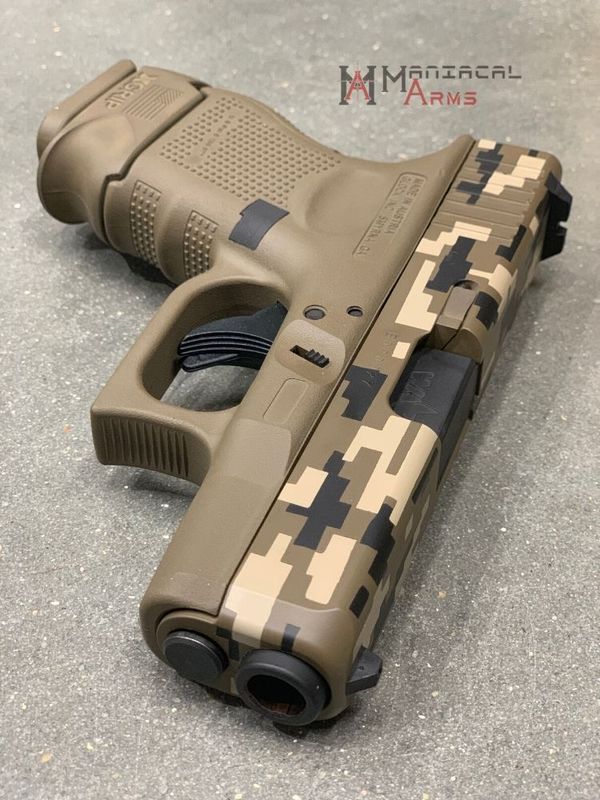 Glock Coating Glock 40 with a Cerakote H-146, H-199 and H-261 Digital Camo Finish by ...