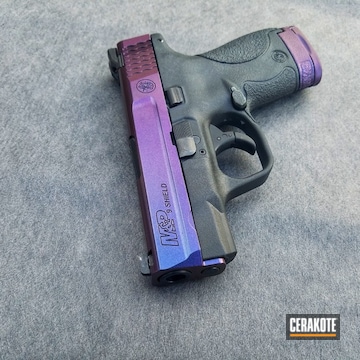 Cerakoted Smith & Wesson Handgun Finished In H-146 And Guncandy Mongoose