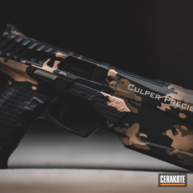 Cerakoted Silencerco Handgun With A Custom Cerakote Multicam Finish