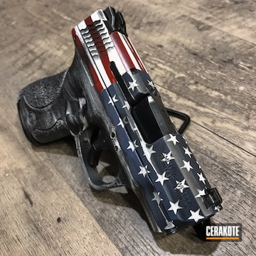 Cerakoted Smith & Wesson Handgun With A Cerakote H-297, H-221 And H-315 American Flag Finish