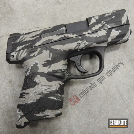 Powder Coating: Smith & Wesson,Smith & Wesson M&P Shield,Graphite Black H-146,Gun Coatings,S.H.O.T,Pistol,Steel Grey H-139,BATTLESHIP GREY H-213,Vietnam Tiger Stripe Camo,SIG™ DARK GREY H-210
