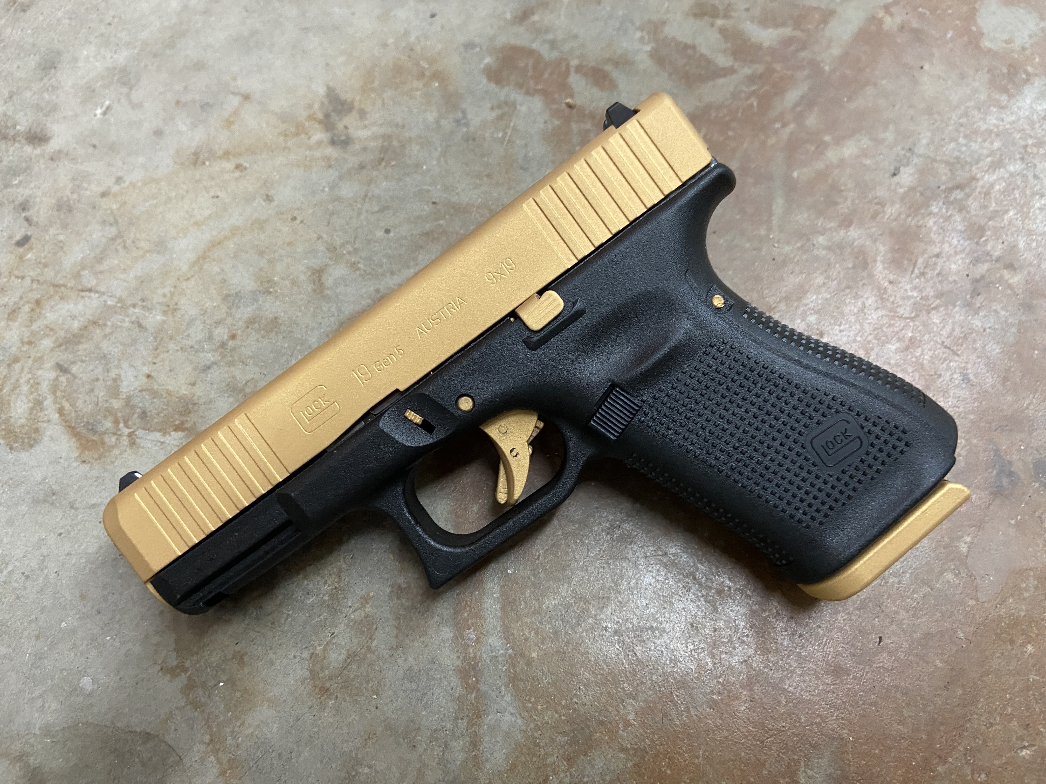 Glock Coating Glock 19 done in Gold | Cerakote