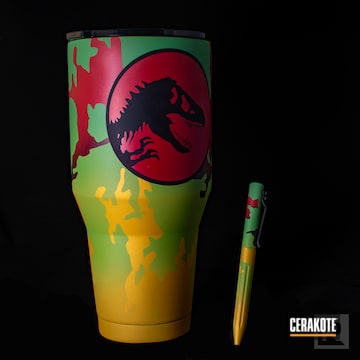 Cerakoted Matching Jurassic Park Themed Tumbler And Pen In H-168, H-316, H-166, H-146, H-318 And H-317