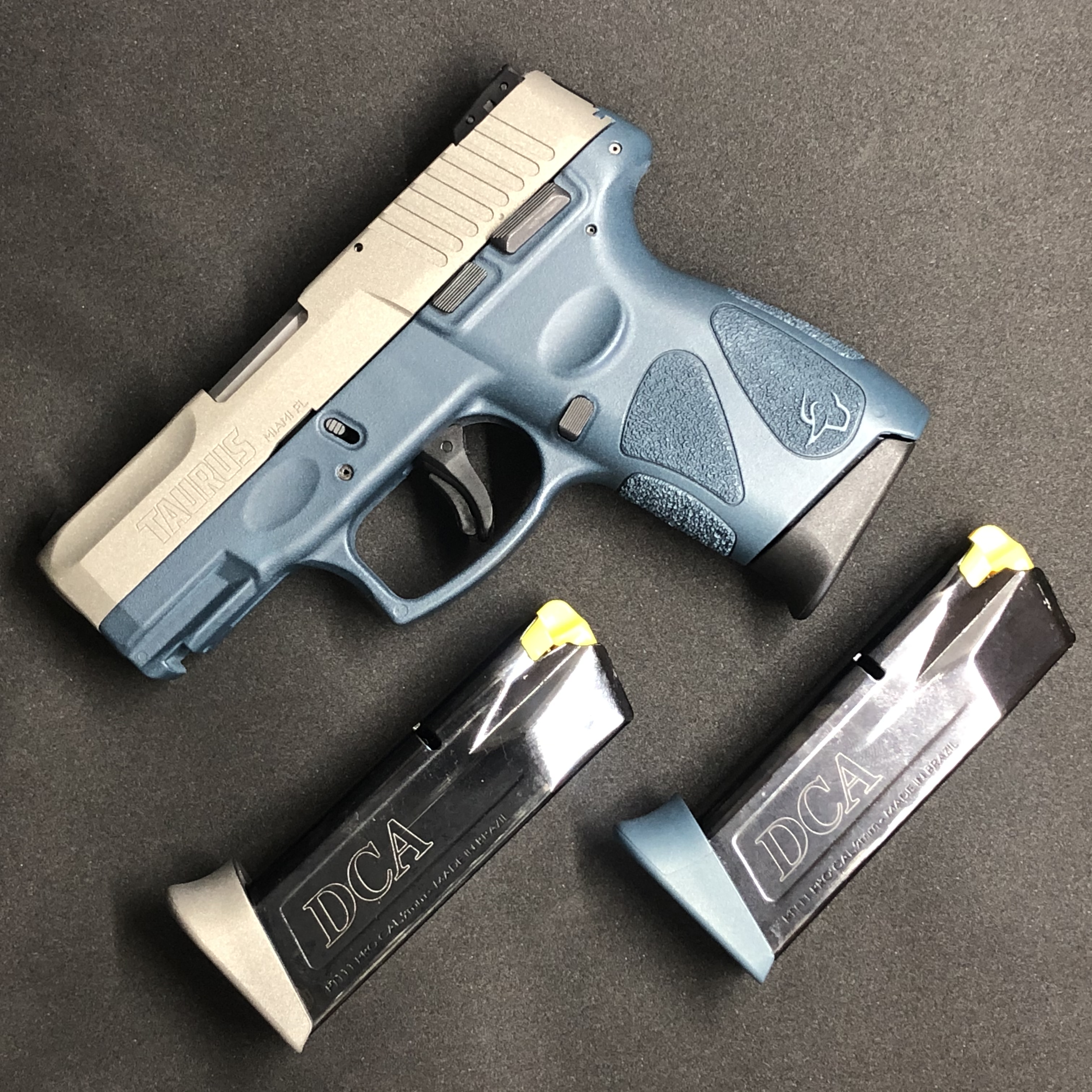 Taurus Color Gun Two Toned Taurus Handgun done in Tungsten and Blue Titanium | Cerakote