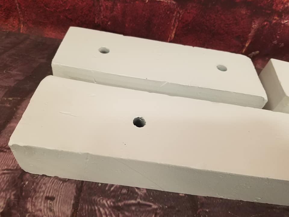 Race Car Weights Coated With Bright White Cerakote race-car-weights-coated-with-bright-white-cerakote