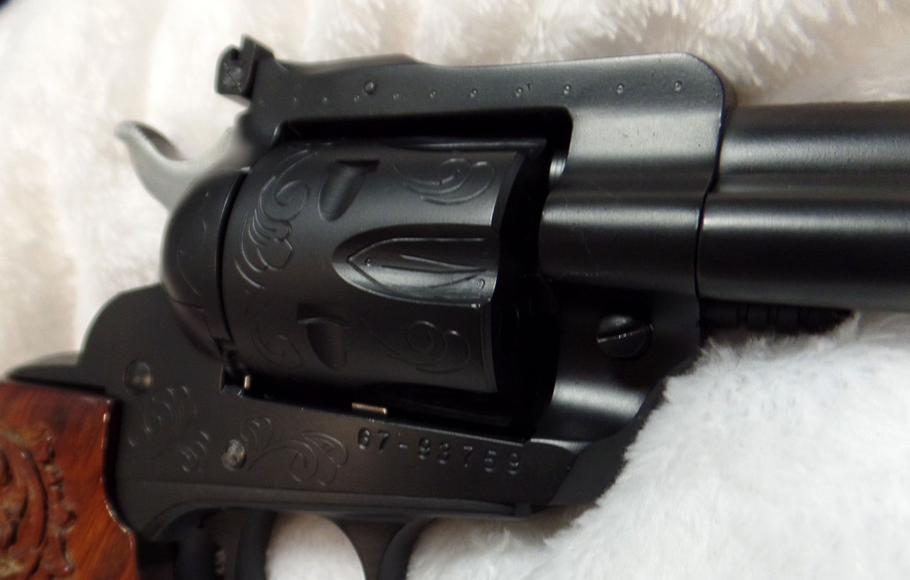 Hand Engraved Revolver in Graphite Black | Cerakote