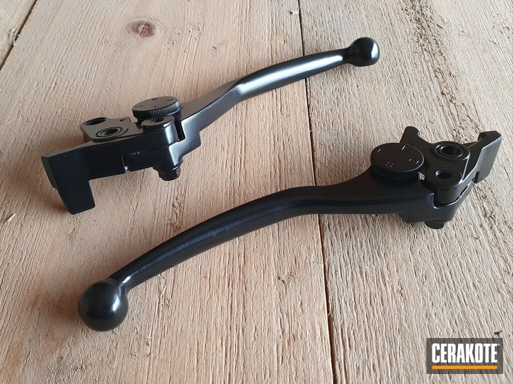 Refinished Kawasaki Motorcycle Parts coated in Graphite Black and