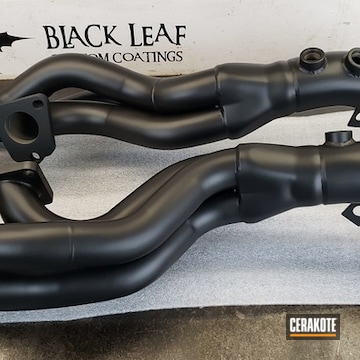 Cerakoted Audi Exhaust Headers In C-7600 And V-136