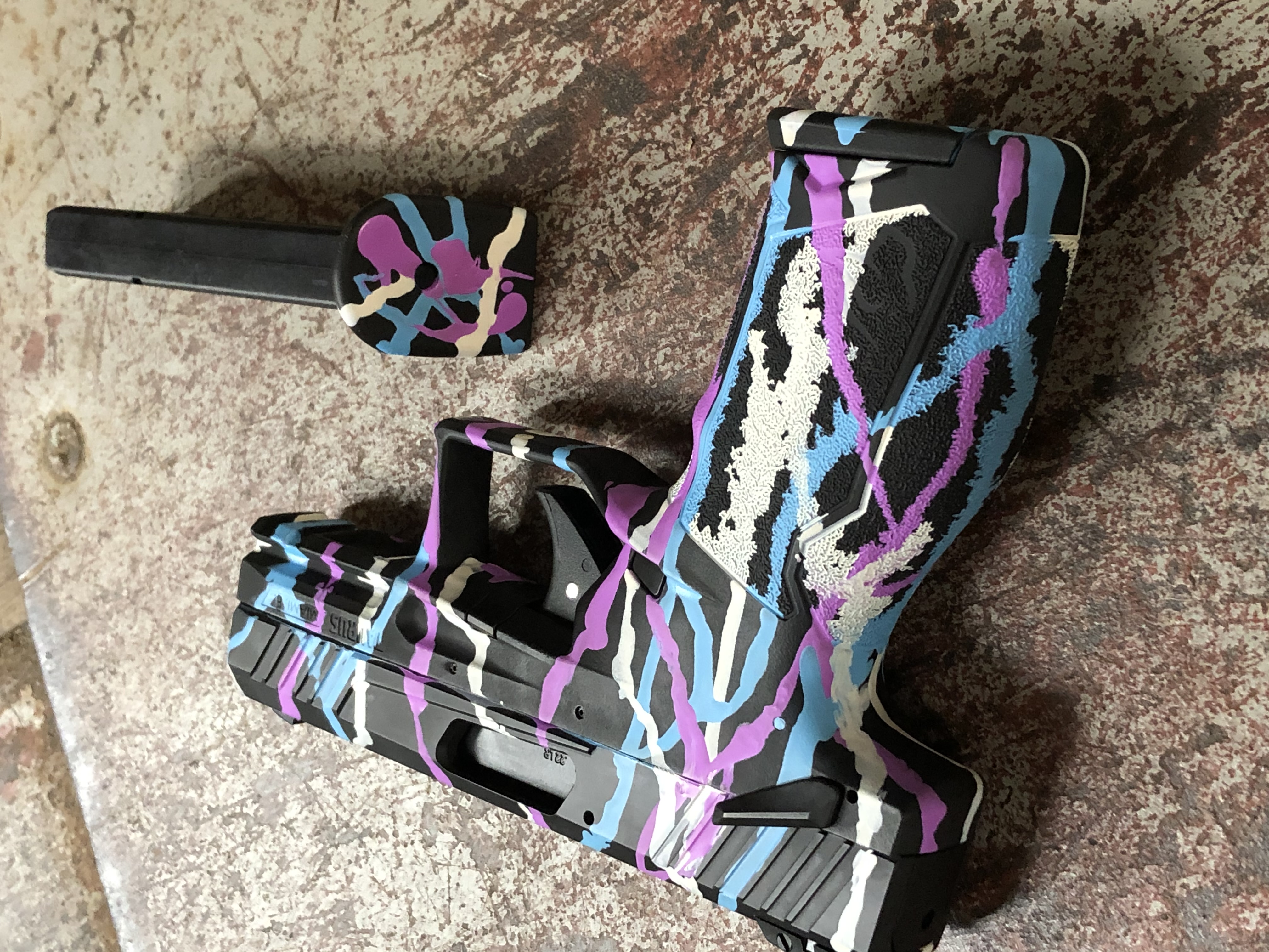 Paint splattered Taurus TX22 Cerakoted using Snow White, Blue Raspberry ...