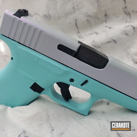 Powder Coating: Glock 43,9mm,Glock,Ladies,S.H.O.T,#Gun Candy,BATTLESHIP GREY H-213,Hesseling,Robin's Egg Blue H-175,GunCandy Pegasus,Color Shift,Shimmer