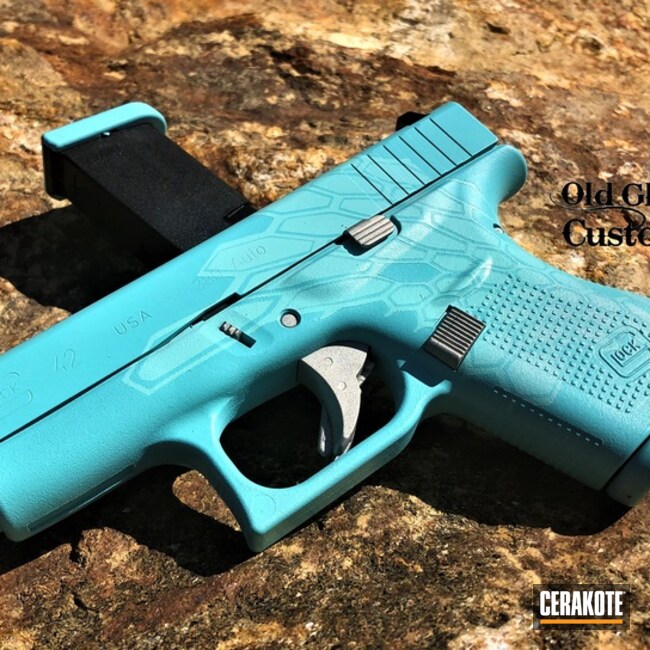 Glock 42 Cerakoted Using Snow White, Shimmer Aluminum And Nra Blue