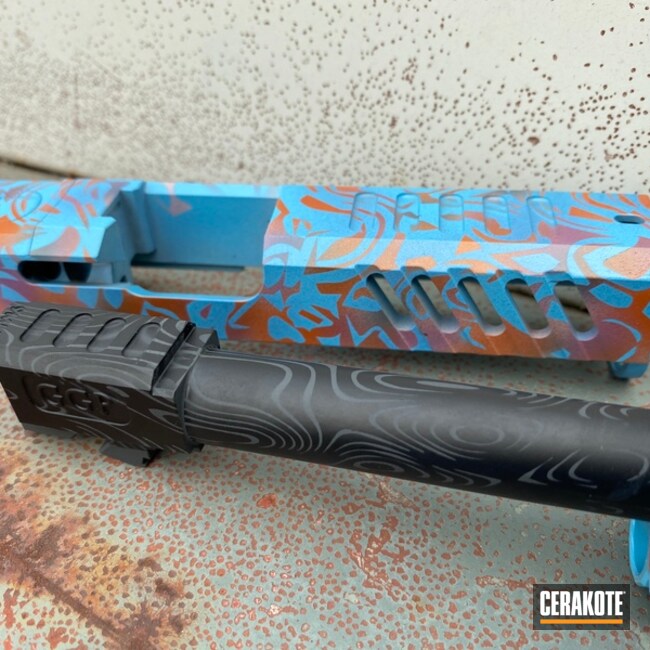 Glock Slide And Barrel Cerakoted Using Ridgeway Blue, Armor Black And Copper Suede