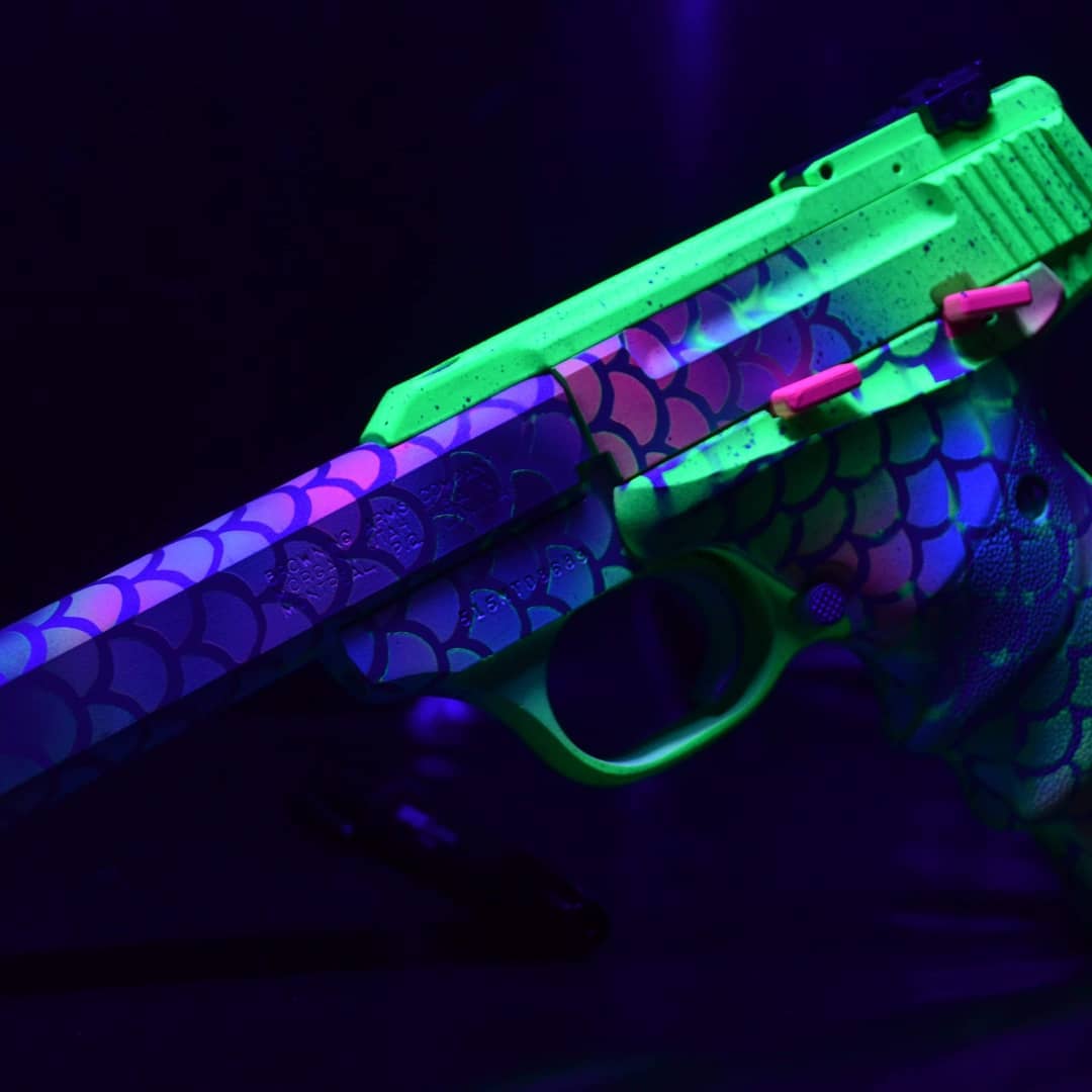 Bronign Raspberry Mermaid Themed Browning Buck Mark Pistol Cerakoted using Blue Raspberry ...