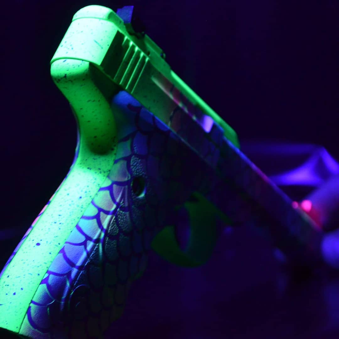 Browning Raspberry Mermaid Themed Browning Buck Mark Pistol Cerakoted using Blue Raspberry ...