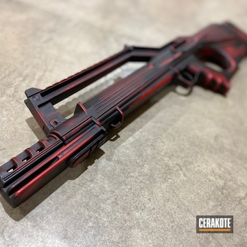 Distressed Bullpup Rifle Cerakoted Using Usmc Red And Graphite Black