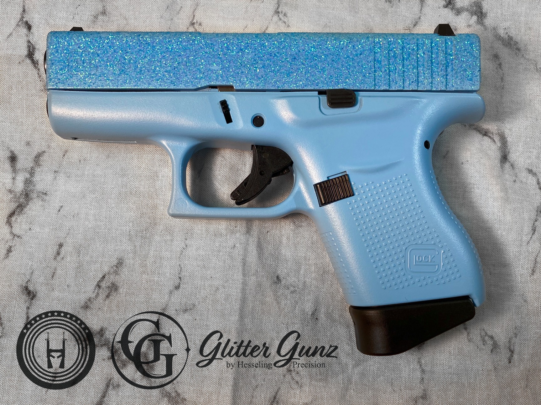 Blue Raspberry Cerakote Glittered Glock 43 Cerakoted using Blue Raspberry | Cerakote