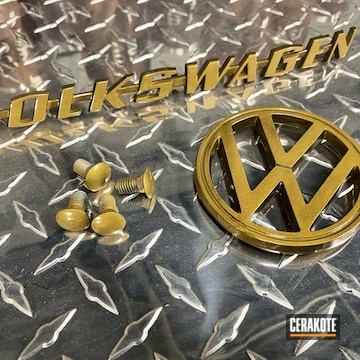 Volkswagen Bug Emblems Cerakoted Using Graphite Black And Gold