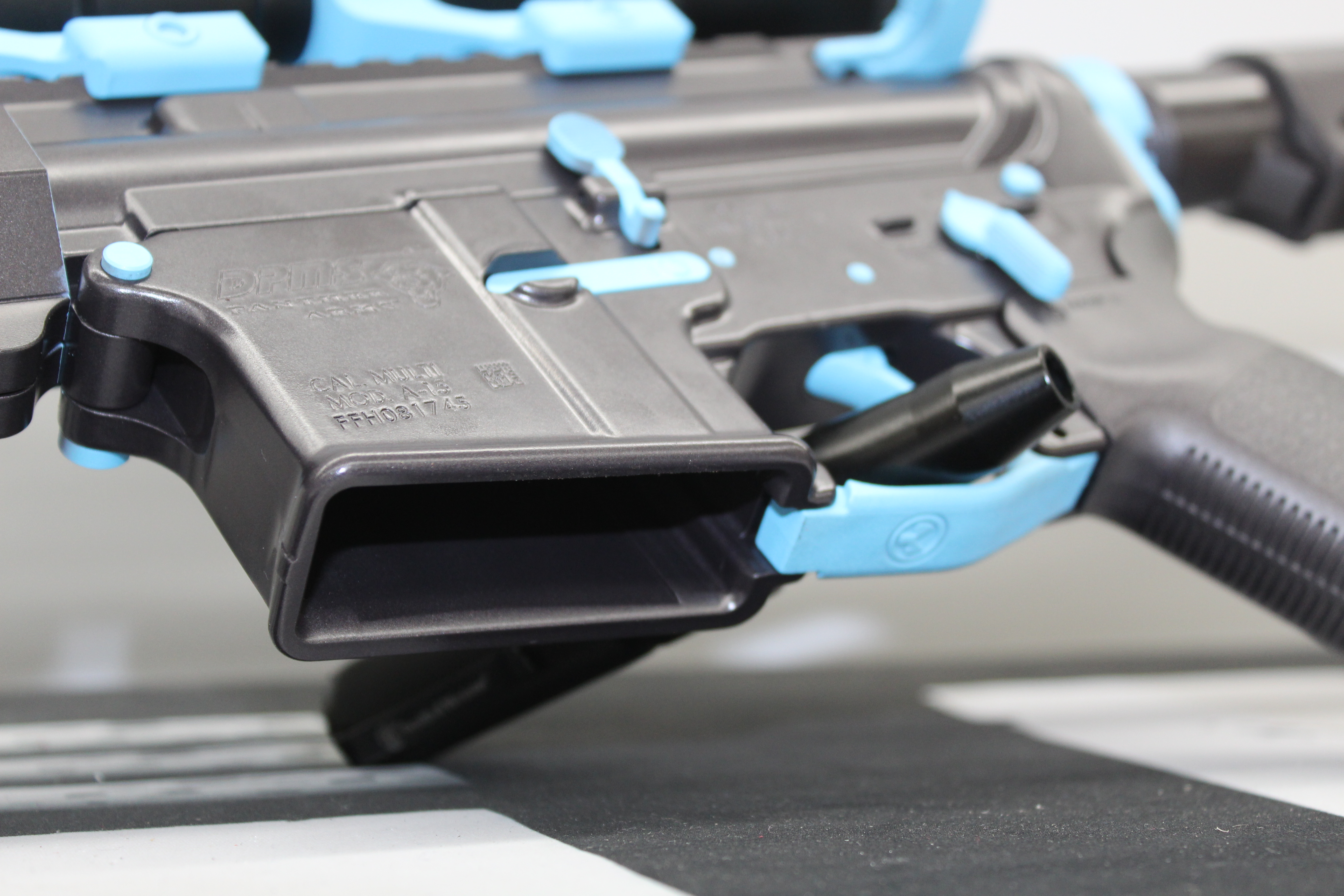 Blue Raspberry Cerakote Custom AR Rifle Cerakoted using Blue Raspberry and Carbon Grey | Cerakote