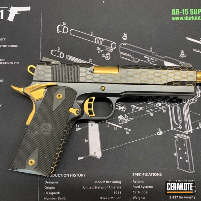 Custom 1911 Pistol Cerakoted Using Blackout And Gold