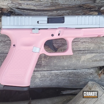 Glock 44 Pistol Cerakoted Using Satin Aluminum And Bazooka Pink