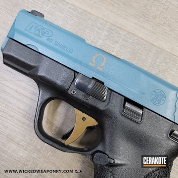Smith & Wesson M&p Shield Pistol Cerakoted Using Jesse James Civil Defense Blue And Burnt Bronze