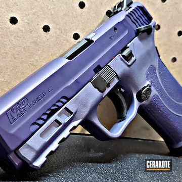 Smith & Wesson M&p Shield Cerakoted Using Black Cherry, Crushed Orchid And Sky Blue