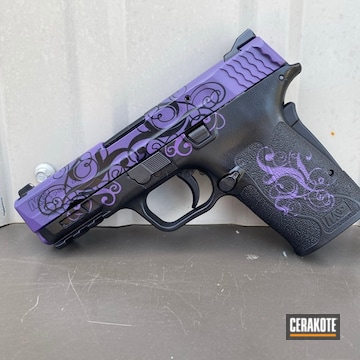Smith & Wesson M&p Shield Pistol Cerakoted Using Graphite Black And Bright Purple