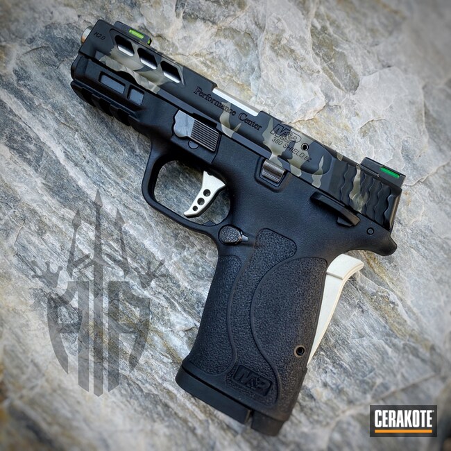Smith & Wesson M&p Shield Pistol Cerakoted Using Graphite Black, Multicam® Dark Green And Magpul® Flat Dark Earth
