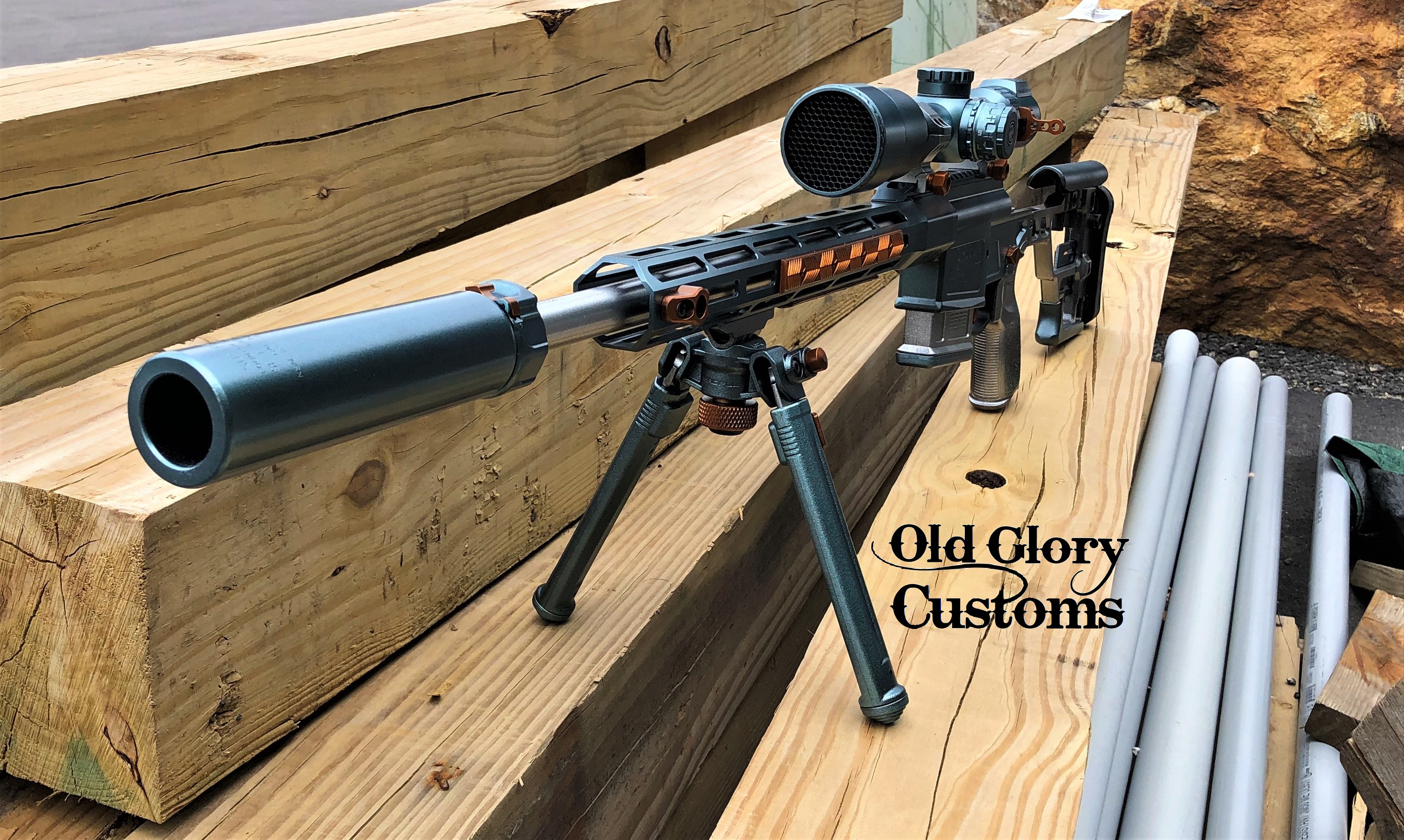 Bolt Action Rifle Cerakoted using Gloss Black and Aztec Teal | Cerakote