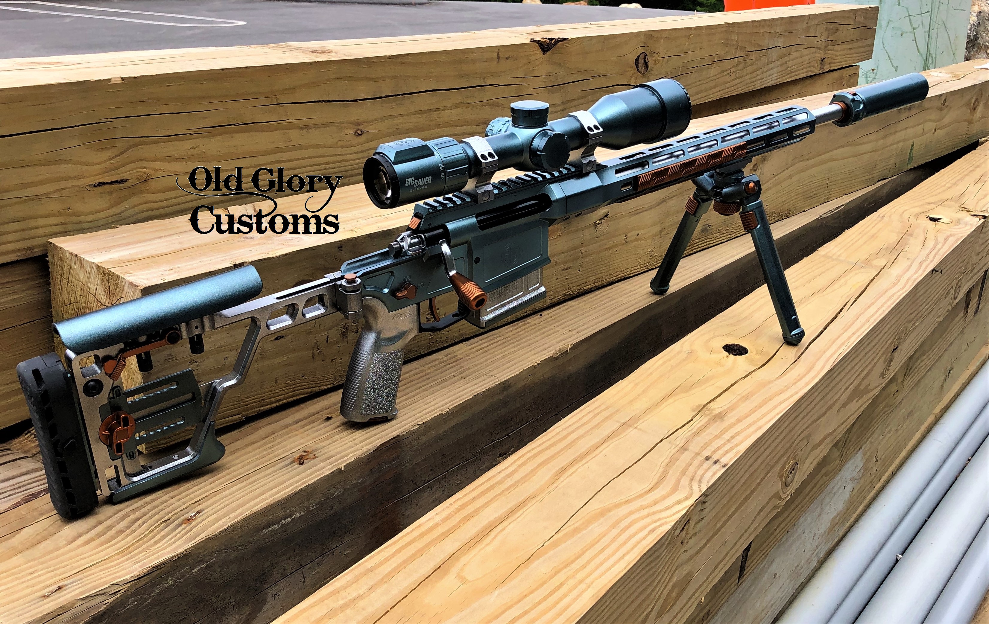 Bolt Action Rifle Cerakoted using Gloss Black and Aztec Teal | Cerakote