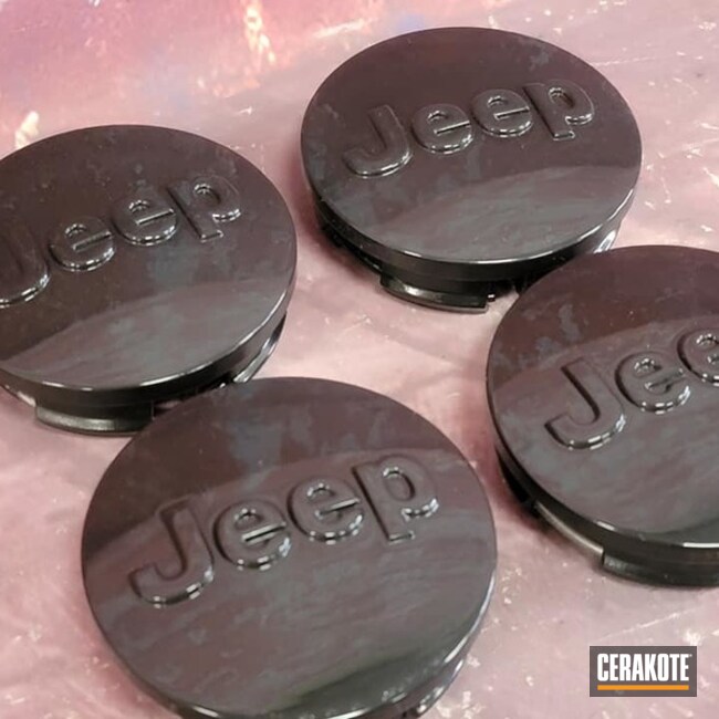Jeep Wheel Center Caps Cerakoted Using High Gloss Ceramic Clear And Graphite Black