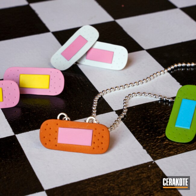 Custom Jewelry Cerakoted Using Bazooka Pink, Tequila Sunrise And Bright White