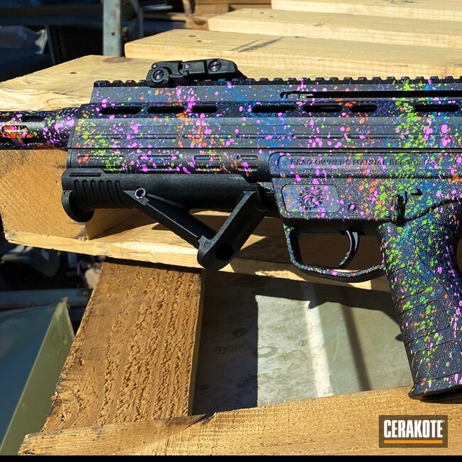 Paint Splatter Themed Bullpup Shotgun Cerakoted Using Hunter Orange, Periwinkle And Zombie Green